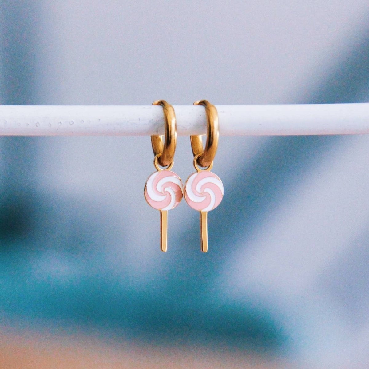 Orecchini con lecca-lecca — rosa/bianco - Infinity Concept Store
