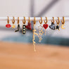 Orecchini a cerchio con cuore a coda di fata —rosso/oro - Infinity Concept Store