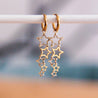 orecchini a cerchio con pioggia di stelle scintillanti— oro - Infinity Concept Store