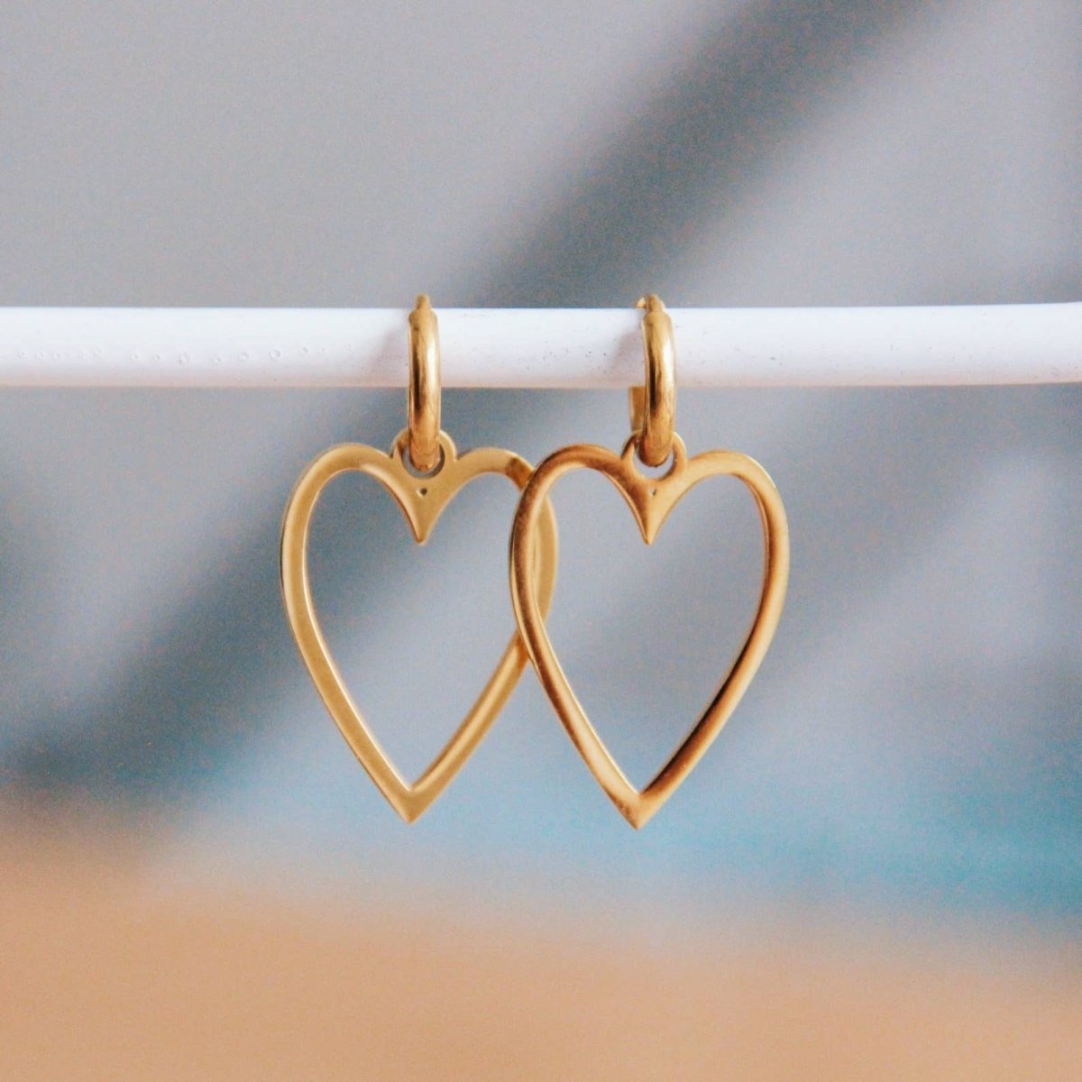 Orecchini a cuore lungo in acciaio - oro - Infinity Concept Store