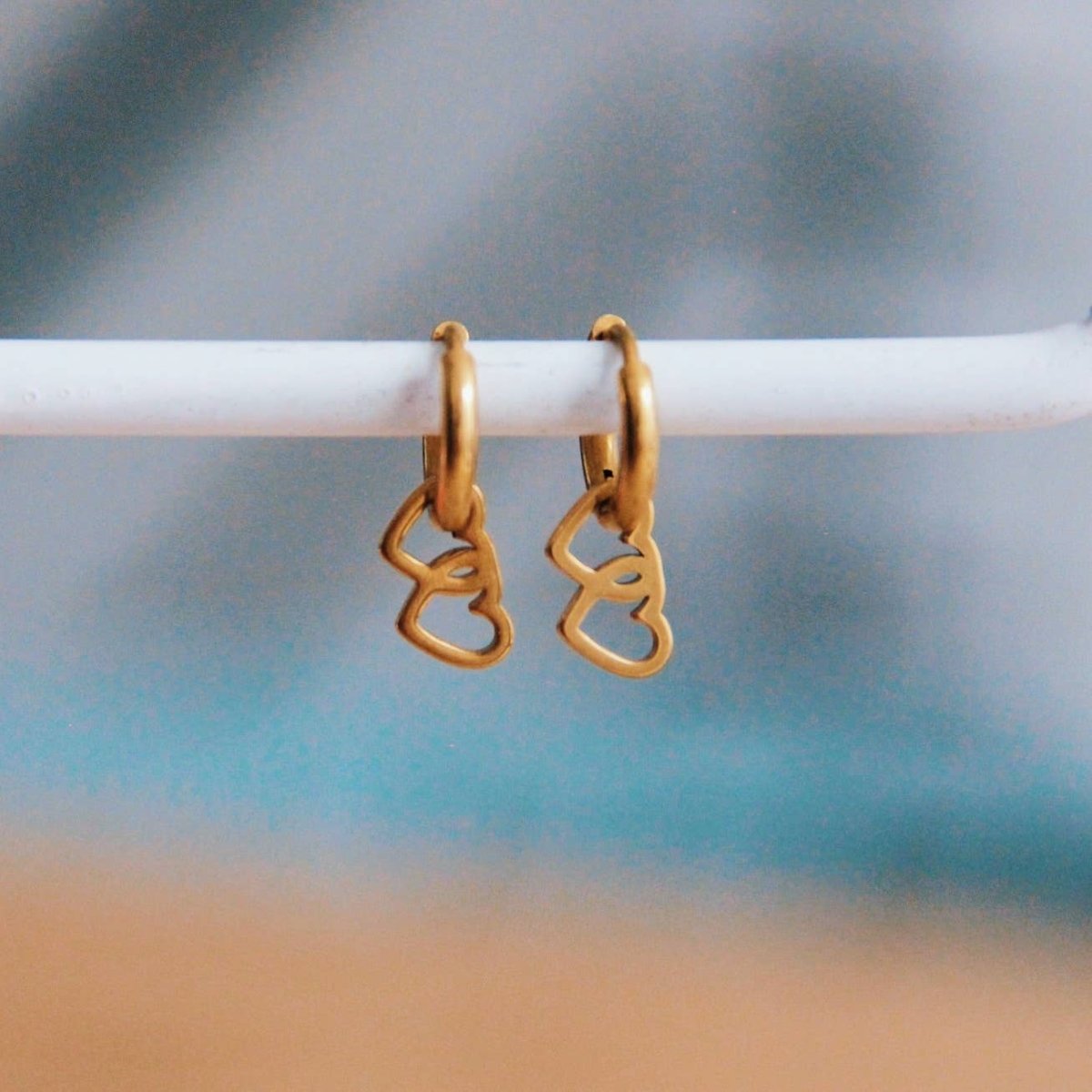 Orecchini in acciaio inossidabile con doppio cuore - oro - Infinity Concept Store